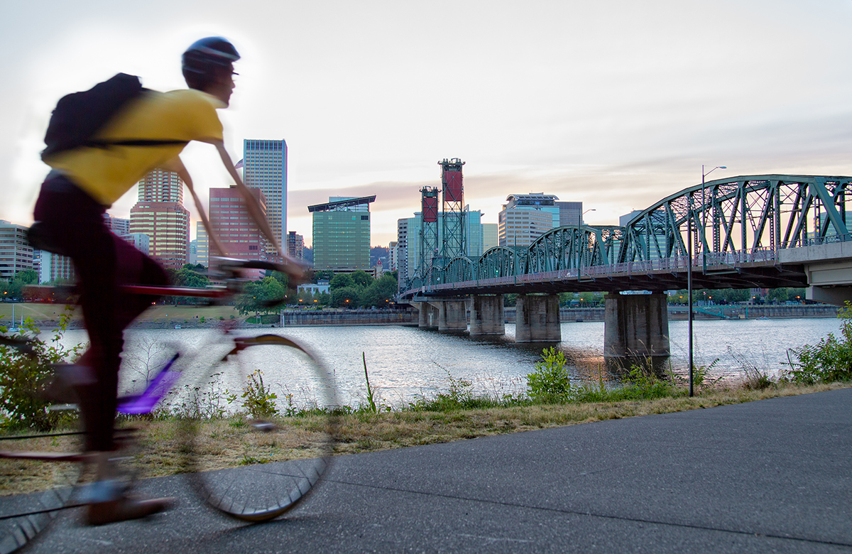 Person riding bike along Portland waterfront